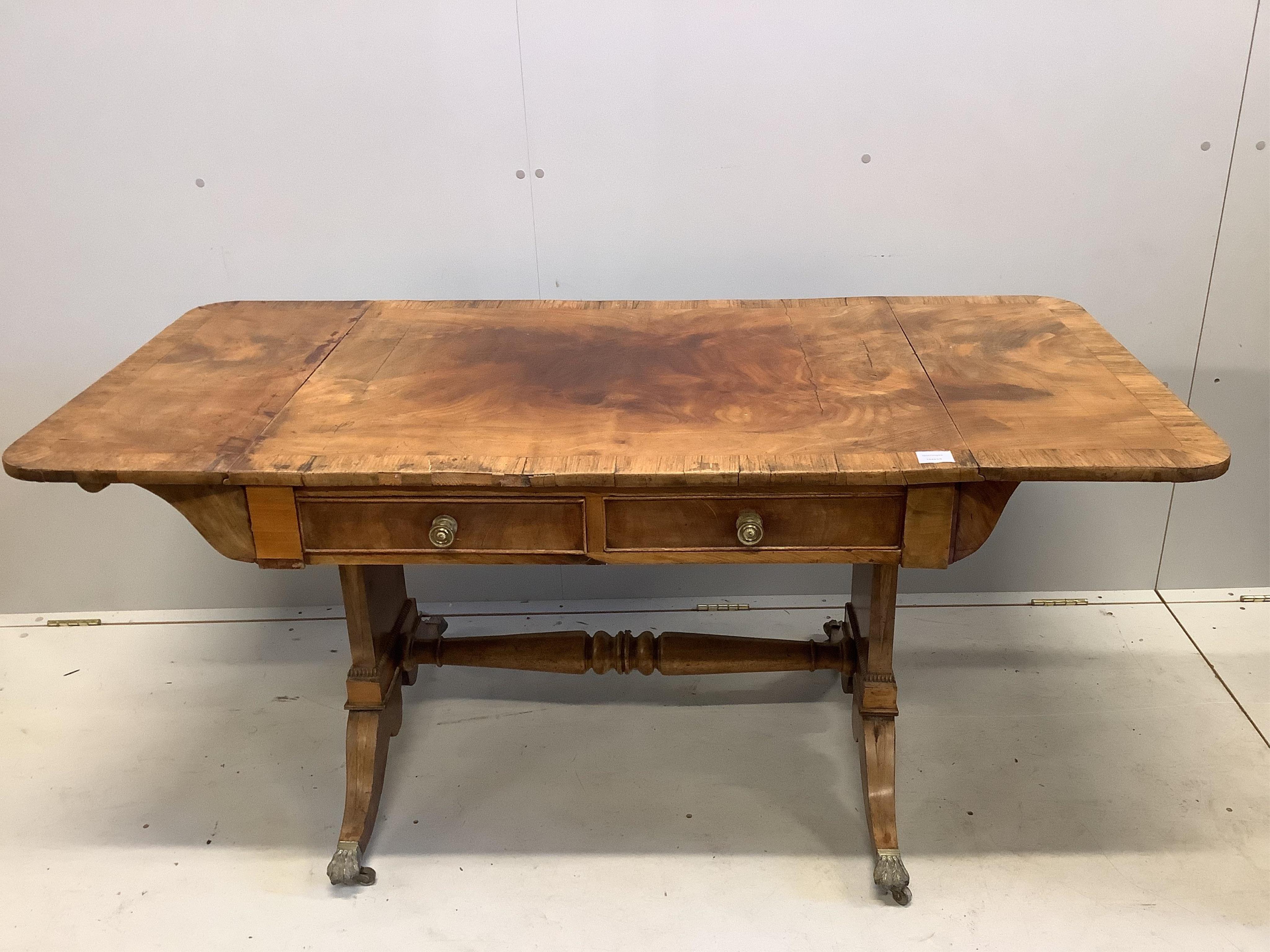 A Regency rosewood banded mahogany sofa table, width 92cm, depth 70cm, height 69cm. Condition - poor to fair